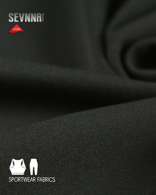 Kain Lycra Stretch menawarkan fitur peregangan dan penyerapan kelembapan yang sangat baik, ideal untuk pakaian yoga, pakaian olahraga, dan seragam olahraga.